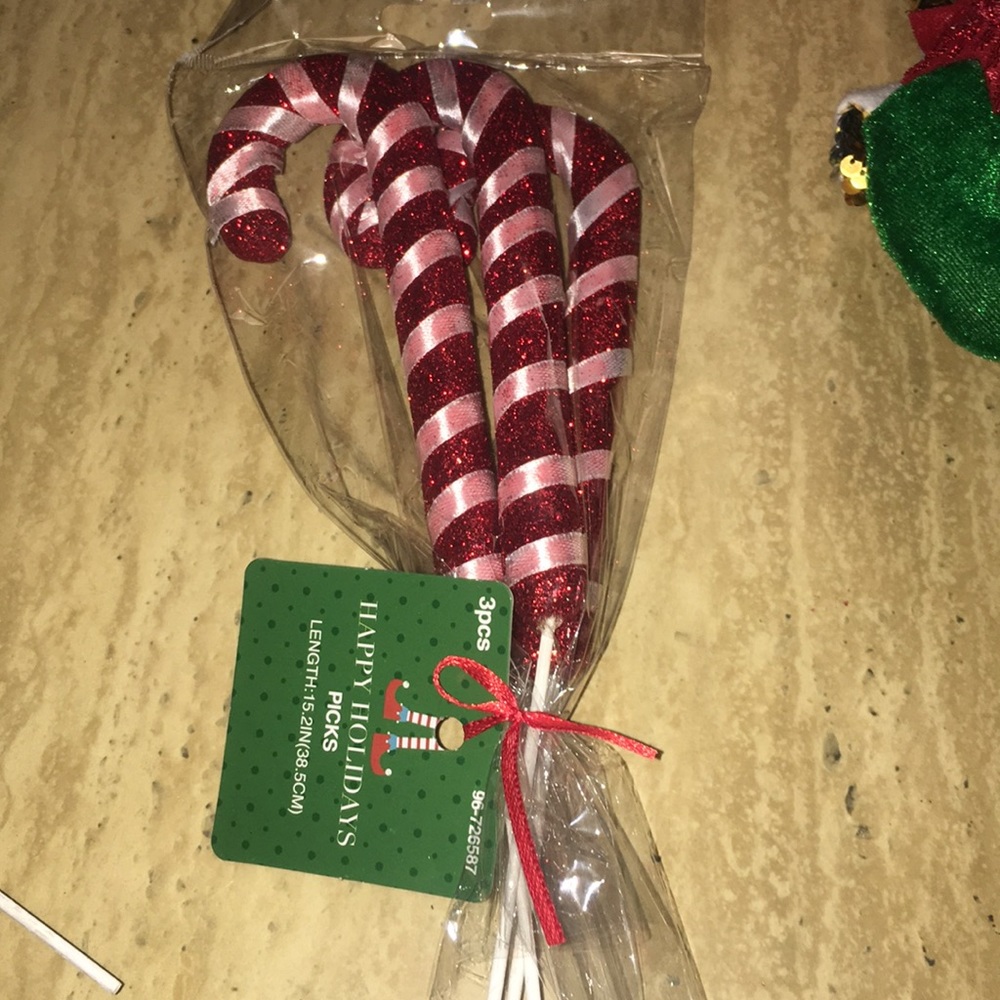 Red Glittered Candy canes with green Ribbons